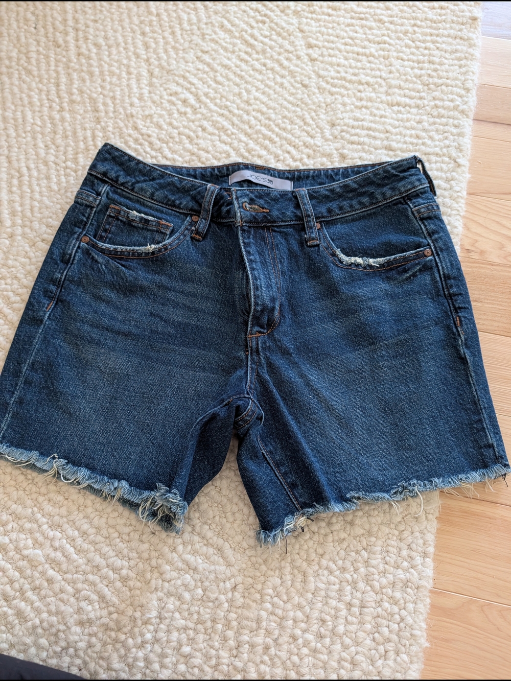 Joe's Jeans light blue denim shorts with orange stitching